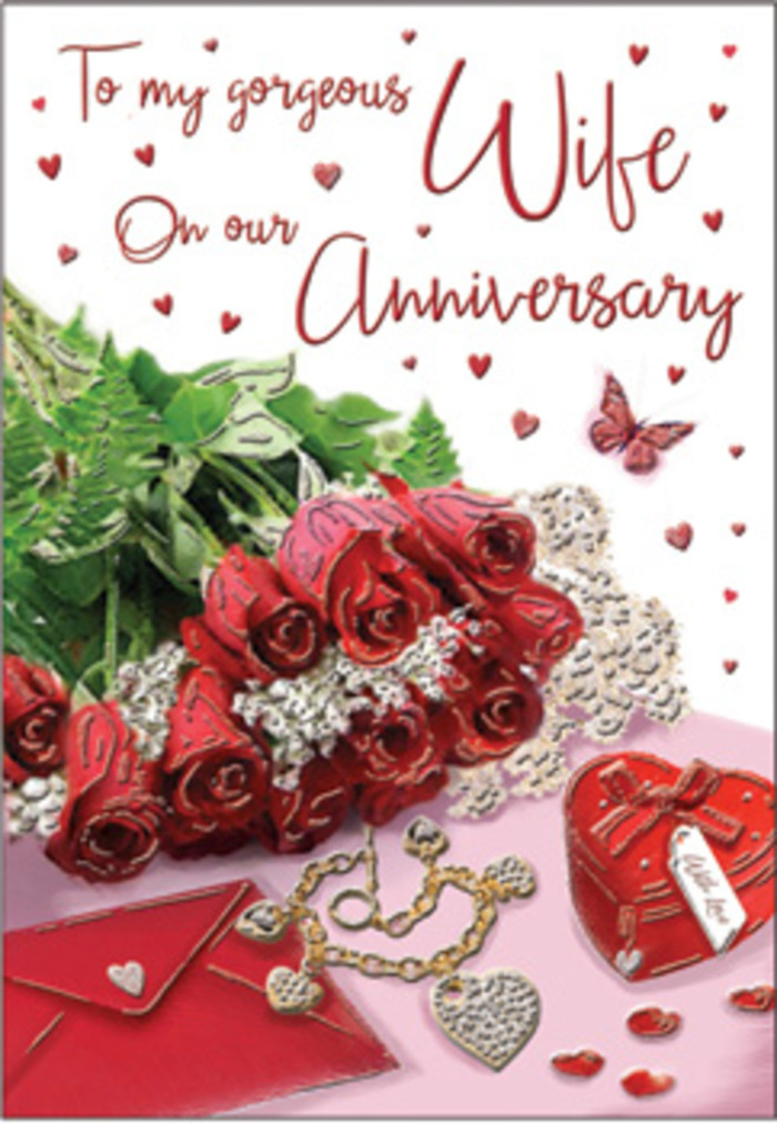 In this richly composed anniversary card design, a bouquet of classic red roses takes centre stage, each bloom full and perfectly formed, like those you might see being arranged in a Hornsey flower shop window on a quiet morning. The roses are wrapped with understated elegance, their deep crimson petals framed by lush green foliage that suggests abundance and life, as steady and reliable as the community around Hornsey and Crouch End. Surrounding the flowers, delicate heart motifs and fine lace-like patterns drift across the scene, lending a sense of old-fashioned romance and tenderness. Nearby, a jewellery set rests by a vivid red box, its polished surface and metallic highlights suggesting a cherished gift revealed in the soft glow of anniversary evening light. Hints of velvet, gold, and silk textures appear throughout the composition-the gentle sheen of metal chain, the smooth finish of a keepsake box, the faint embossed texture of the card itself-all subtly illuminated to create a warm, embracing atmosphere. Scripted words sweep across the card in flowing, romantic lettering, visually echoing the sentiment of years spent together, weathering seasons like those changing around nearby Alexandra Park. The entire arrangement feels thoughtfully curated, as if a florist with an eye for story and symbolism placed each element to honour long-term love. The mood is deeply romantic yet reassuring, capturing the feeling of being held in a familiar embrace, making this design ideal for celebrating an anniversary that marks not just another year, but a history of shared laughter, quiet support, and treasured moments at home in Hornsey.