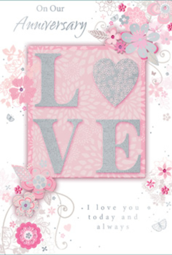 In this detailed view of a romantic anniversary card, the design invites the eye first to the word LOVE, set prominently at the centre in raised, glitter-touched lettering that almost looks hand-painted with frosted sugar. The letters are softly rounded and generously spaced, filled with a gentle blend of blush pink and pearly white tones, edged with a fine shimmer of silver that sparkles like evening light glancing off the shop windows along Hornsey High Street. Surrounding this focal point is a graceful frame of stylized flowers and curling vines, their fine outlines suggesting careful pen work rather than bold strokes. The petals are tinted with blush pink, pale rose and muted mauve, complemented by pale grey leaves and tiny buds, echoing the subtle romance of a pastel bouquet designed for an intimate anniversary dinner at home. These florals, though illustrated rather than real, convey the same sense of movement you would see in a loose, garden-inspired arrangement created by an experienced local florist. The background is a serene, soft pink wash that deepens slightly behind the central word, giving the impression of a gentle halo around the sentiment. Flickers of silver foil highlight some petals and flourishes, catching the light like droplets of dew you might notice on morning walks through Priory Park. An elegant script message-speaking of love today and always-sits delicately beneath or beside the main motif, balanced and understated. The entire composition feels tender and airy, like a whisper of affection preserved on paper, ideal for pairing with a bouquet delivered across Hornsey to celebrate years of shared journeys and quiet, steadfast love.