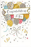 This photograph shows a refined, festive congratulations card, the kind you'd find paired with a celebratory bouquet in a Hornsey flower shop window. The design centres on a graceful cluster of illustrated balloons lifting toward the top of the card, their rounded forms overlapping softly. Each balloon is painted in gentle shades of metallic gold, brushed silver, champagne cream, soft sky blue, blush pink, and muted grey, creating a harmonious, pastel-tinged palette. The surfaces are decorated with delicate patterns: there are fine glitter-like sparkles, tiny star motifs, slim stripes, and scattered dots that suggest a subtle shimmer whenever the card catches the light. From the base of the balloons, slender ribbons in gold and silver flow downward in loose curls, reminiscent of party streamers swaying during a celebration in a home off Hornsey High Street. Across the centre of the card, a classic banner sweeps horizontally over the balloon cluster, carrying the words Congratulations To You in graceful, looping script that feels heartfelt and slightly formal. The background is soft and uncluttered, tinted in a pale tone that lets the metallic details stand out. Around the main composition, smaller stars, swirls, and confetti-like flecks drift outward, creating the impression of movement and joyful energy without overwhelming the eye. The mood is light, polished, and full of quiet happiness, ideal for marking life's proudest milestones-be it a graduation, promotion, exam success, or a personal achievement-anywhere in Hornsey, from the streets near Crouch End to the avenues leading toward Muswell Hill.