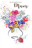 This illustrated Mother's Day card shows an exuberant, hand-painted bouquet that seems to spill out of its vase with joyful energy, reminiscent of fresh flowers carried home from a little florist off Hornsey High Street. The flowers are created from loose sweeps of watercolour, with deep indigo lines sketching the arcs of stems and petals, while bright cerise, rich magenta, and warm rose tones form the heart of the arrangement. Surrounding these are softer blues, lilacs, and touches of apricot and chartreuse, each colour blending into the next so the bouquet appears airy yet full, like a spring arrangement just gathered at dawn. Delicate gold accents trace along selected petals and leaves, catching the light and giving the impression of dew or a fine metallic ink, adding a luxurious but gentle highlight to the design. The vase below is gracefully understated, suggested by pale washes and a subtle curve, finished with a slender gold detail that hints at a ribbon or bow without overwhelming the blooms above. Scattered around the bouquet are light-hearted splashes of paint and tiny hearts, fanning outwards like petals tossed into the air in celebration. The white background keeps the focus firmly on the colour and movement of the flowers, allowing every brushstroke to speak of love, appreciation, and the comfort of home. The card carries a mood of affectionate celebration, perfect for capturing the gratitude a child feels when saying thank you, Mum in vivid, painterly colour.